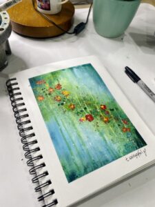 abstract painted flowers in an art journal