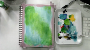 painting the background with green, blue, and white acrylic paint