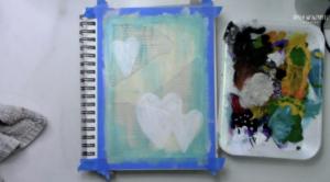 adding acrylic paint to art journal