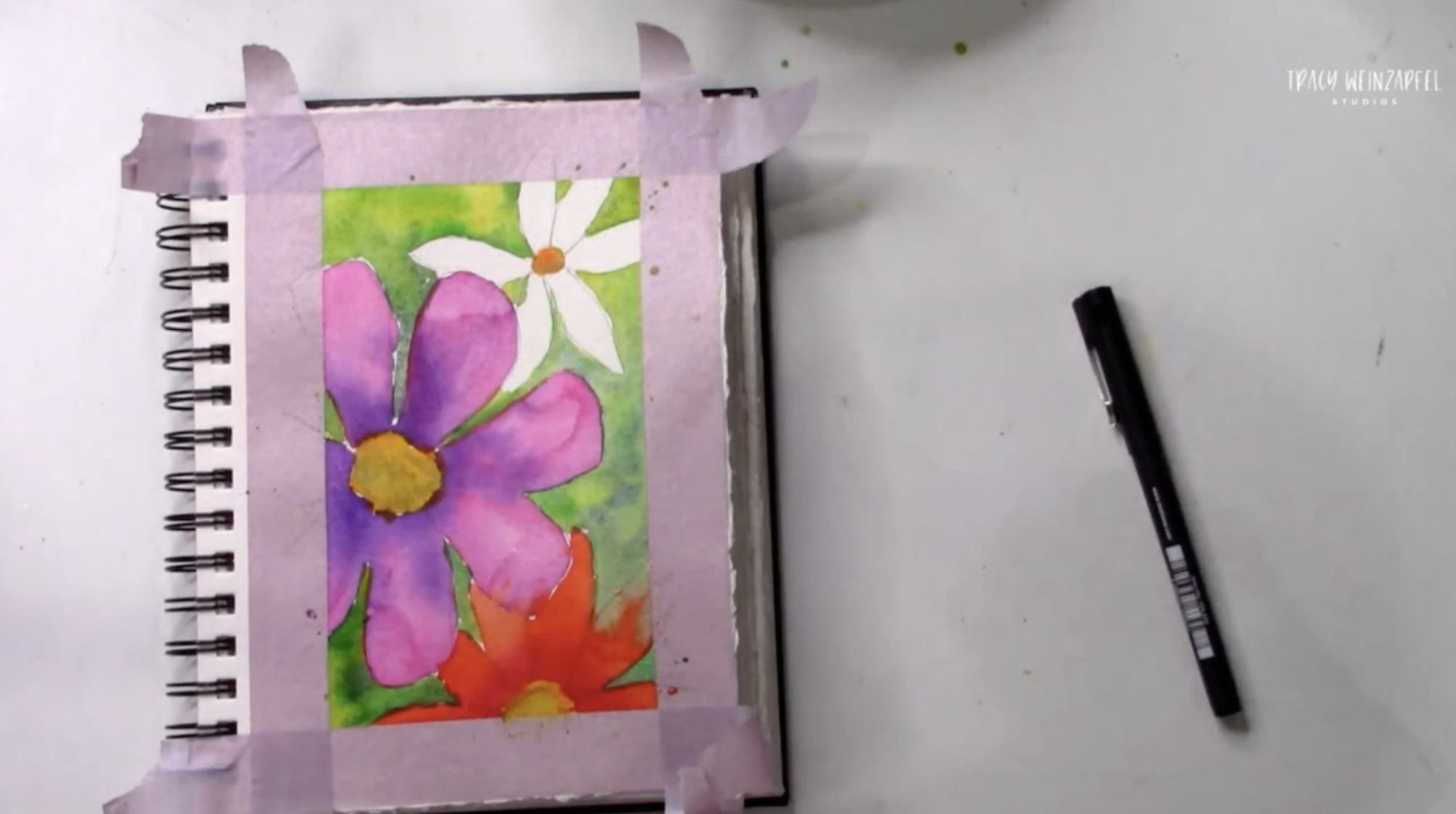 Adding watercolor paint to flowers