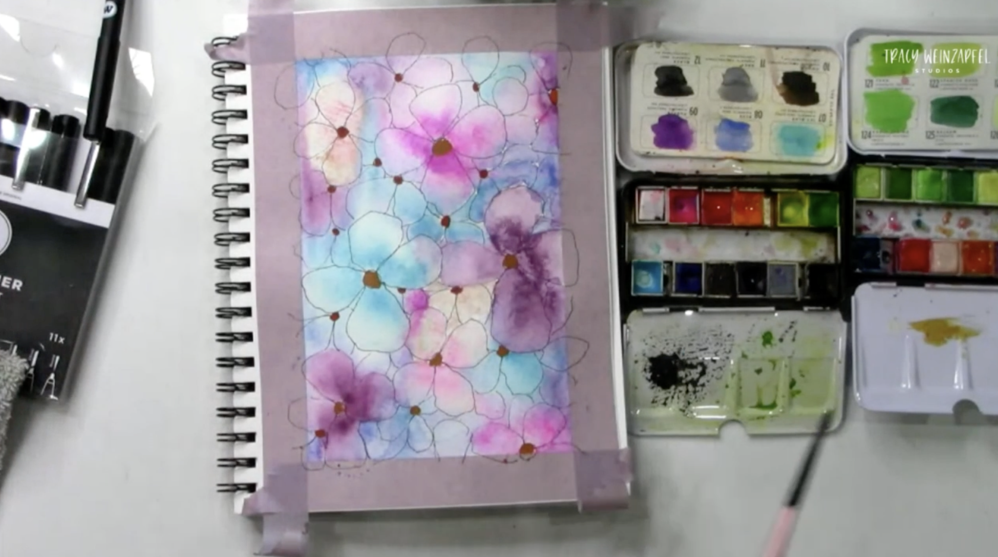 adding watercolor paint to flowers
