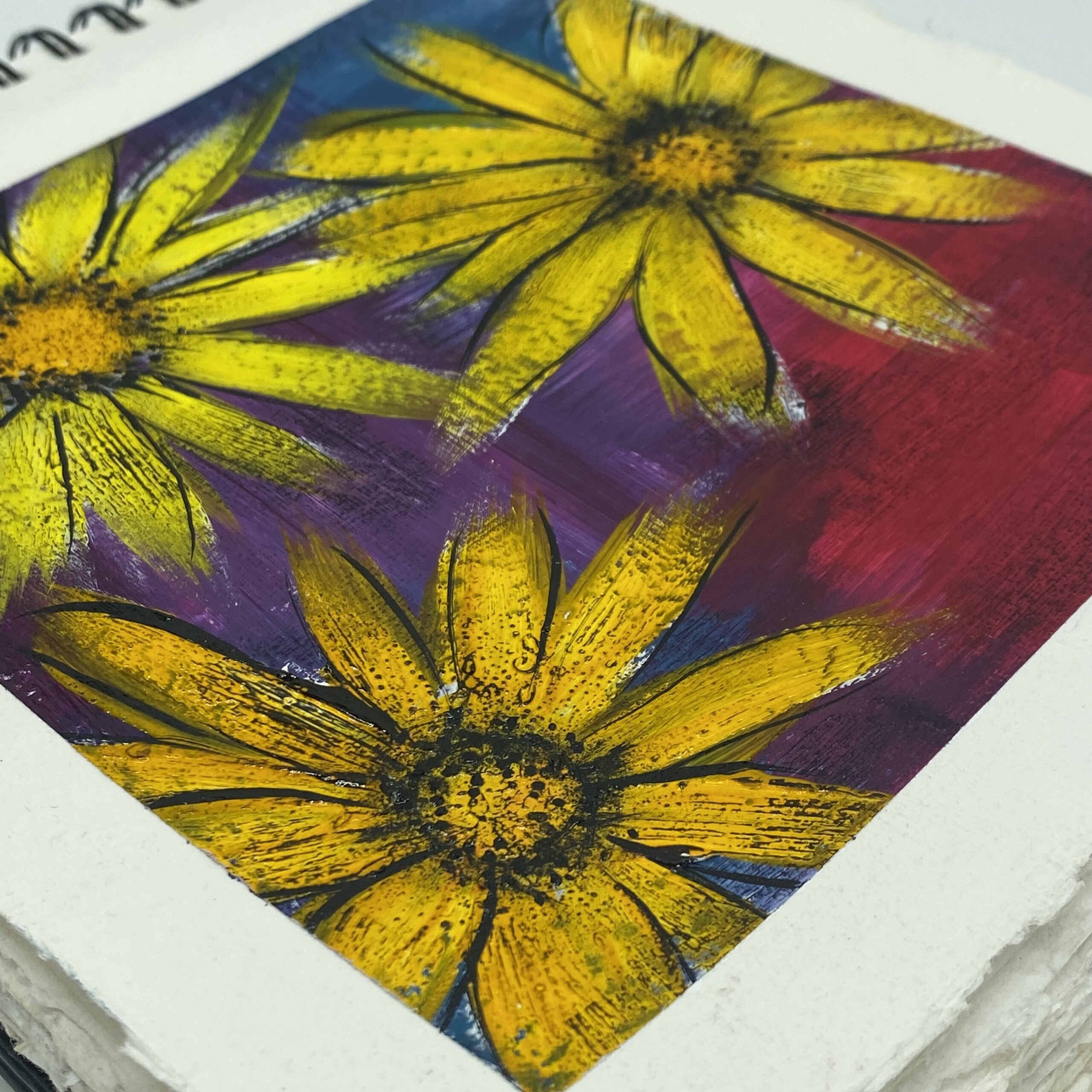 finished art journal page with yellow flowers