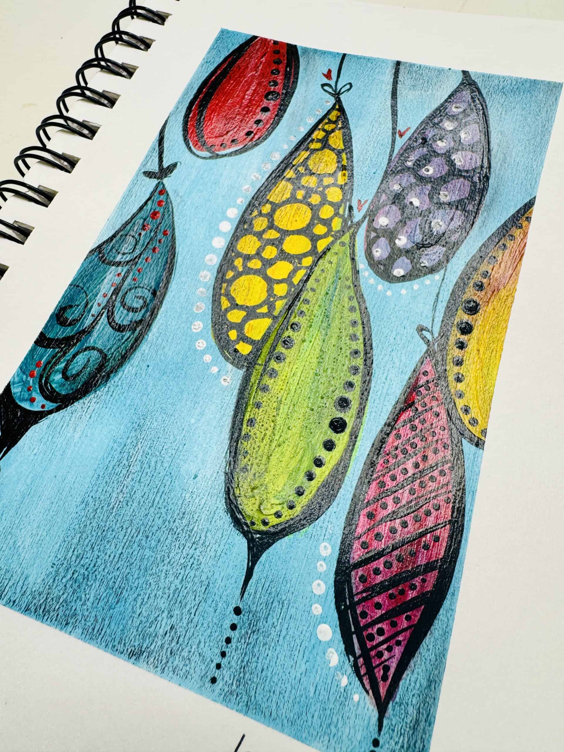 finished art journal page petal pods