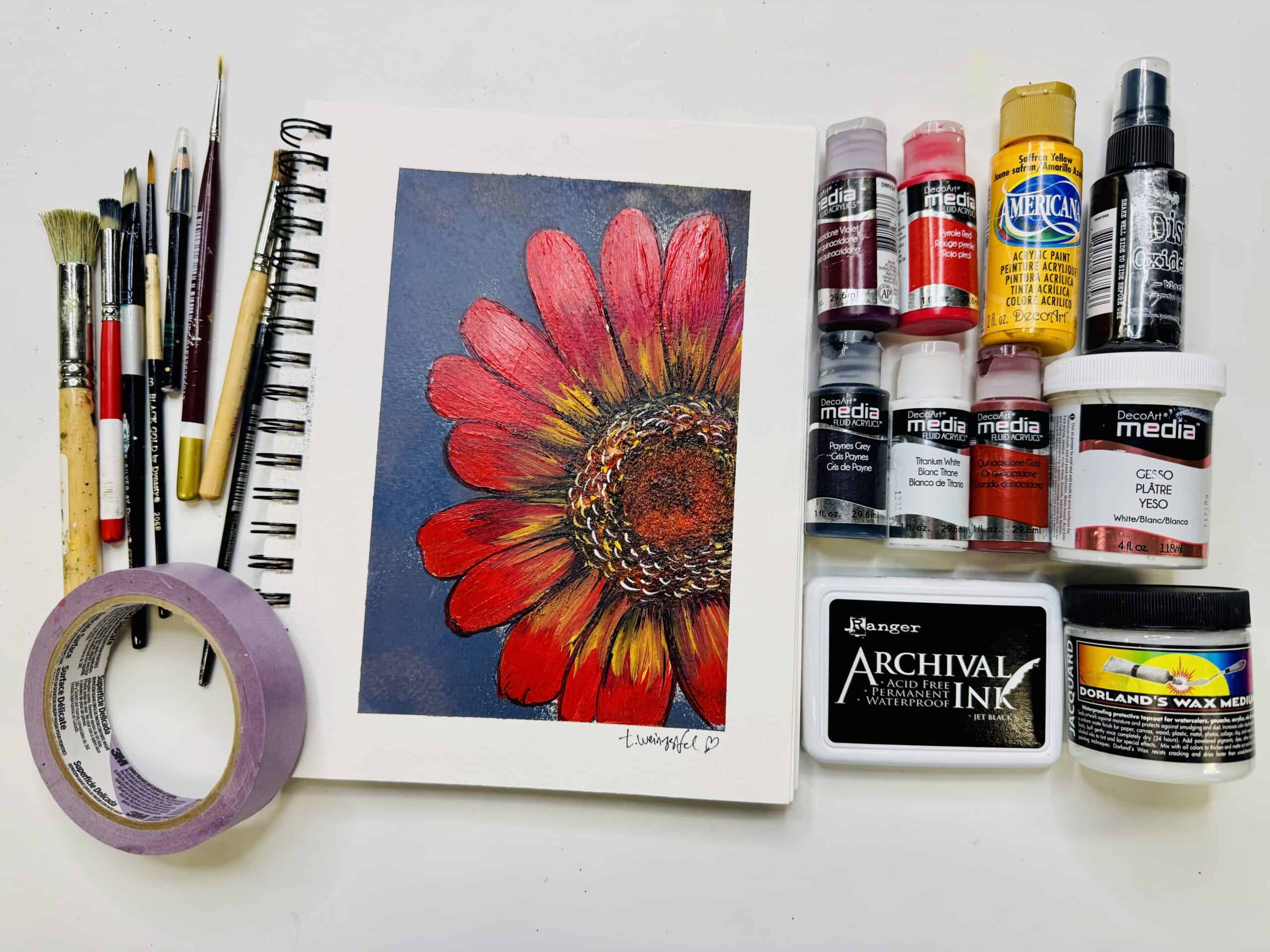 finished art piece with supplies