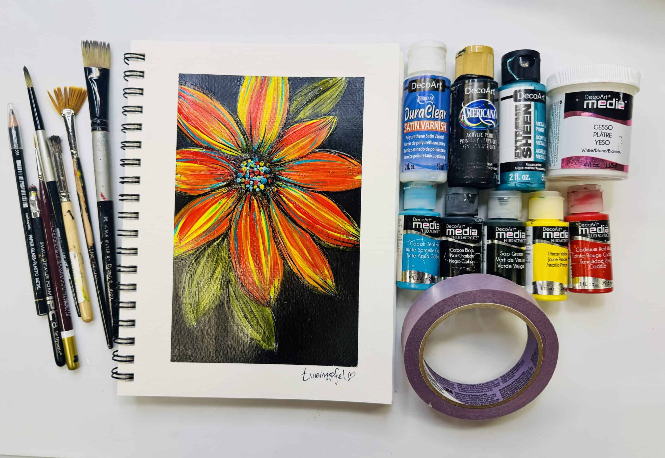 Bold wildflower art journal with supplies